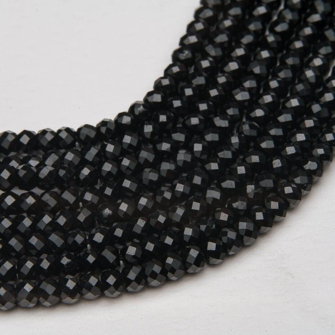 Faceted black crystal obsidian strand reflecting 4mm roundel small beads  15.5 inch
