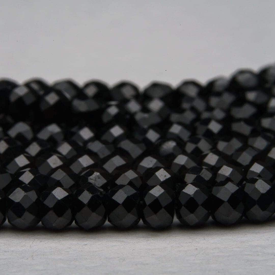 Faceted black crystal obsidian strand reflecting 4mm roundel small beads  15.5 inch