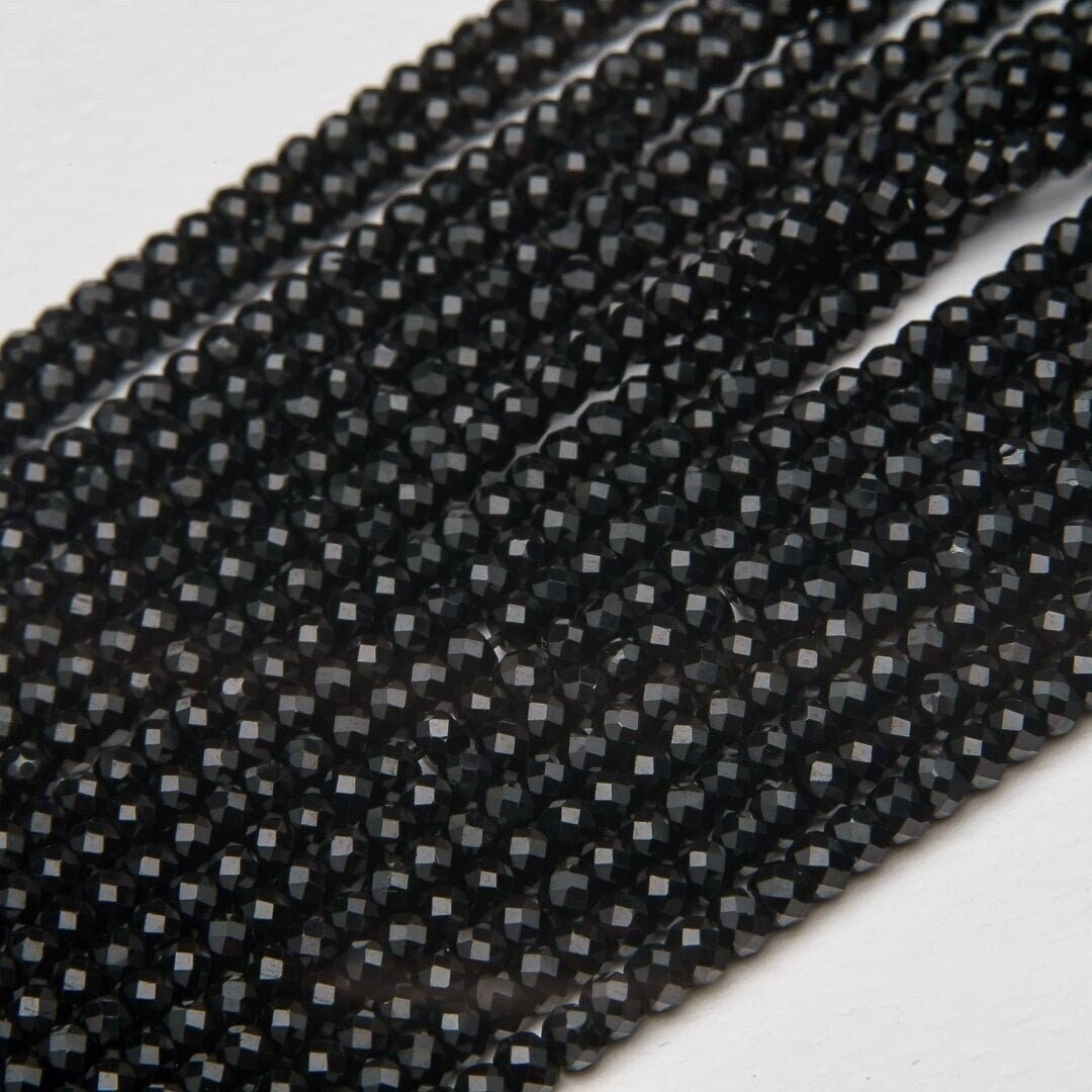 Faceted black crystal obsidian strand reflecting 4mm roundel small beads  15.5 inch