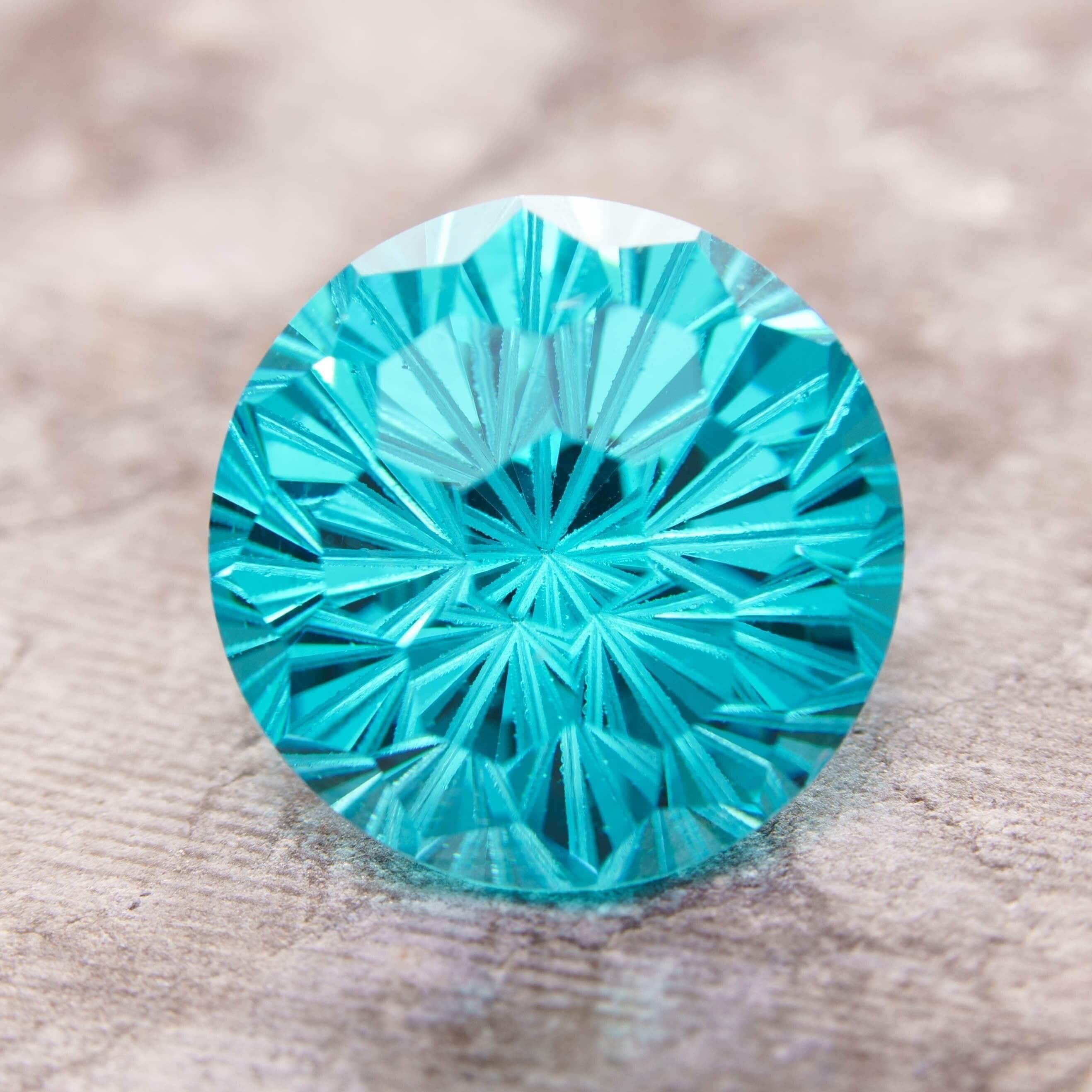 Loose 10mm aqua blue fantasy round cut cubic zirconia